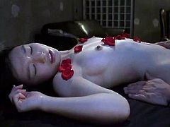 An Asian girl two guys fuck and have some light bondage fun