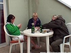 An older couple invites a younger girl to their bed