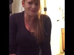 Mature ginger rides her toy