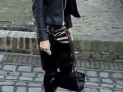 Sexy blonde lady black wet-look-outfit