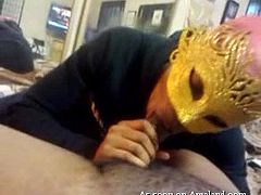 This guy is getting a blowjob from his girlfriend, which is awesome no matter how and where it happens. She's a little kinky though, or just doesn't want to be seen on camera, because she stays concealed the whole time. She wears a mask like you'd see in a Mardi Gras parade or a masquerade.