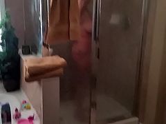 Thick married MILF soaping up in shower