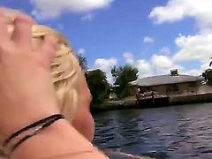 Cassidy Ryan is removing her clothes on the boat since it is hot out. She plays with the fishing pole. After that the blonde pornstars plays with another kind of pole.