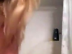 hot teen plays with her pussy in the shower