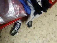 Shoes of unknown girls, in gym, cum inside black converse