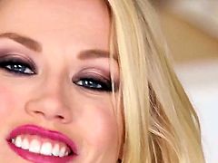 Adorable blonde is massaging her pussy lips close up to the camera. She has a shaved pussy that is getting a lot of attention in this short movie along with her natural tits.