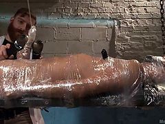 wrapped up man with a hard cock