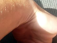 Cute horny amature fingering pussy while driving