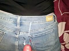 Cumshot on her Levis jeans