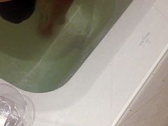 Sissy crossdresser gets huge black dildo in tub