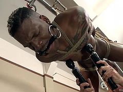 Master didn't show any mercy on Aaron Reese. He tied the black hunk and suspended him. He used a vibrator on nipples and to maximize the pleasure, he licked the black slave's feet. Once the BBC become rock hard, the cruel master tortured the slave, by giving rough blowjob and fast handjob.