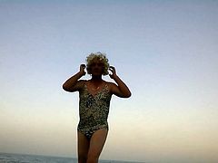sissy ken in swimsuit on a beach