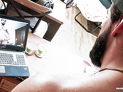 Pascal was playing a game with Zack on webcam. That's the bearded hunk by the way, and yeah, Pascal is one lucky bastard. The wheel is filled with sexual things for Zack to do, and he has to do what it says on the space where it stops.
