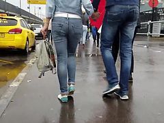 Young woman wriggle ass in tight jeans