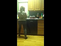 Ass in tight jeans in the kitchen