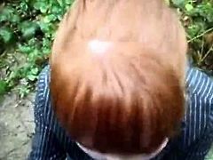 Gorgeous redhead sucks a big cock on pov