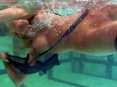 Blonde Feher with big firm tits underwater