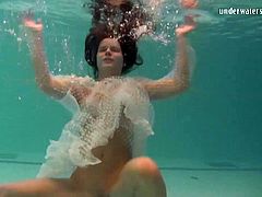 White moth in a dress underwater