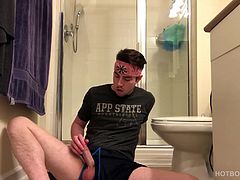He pulls that big stiff dick out the leg of his shorts and lets it pop out the waist band, as he edges himself a few times. Finally, the young man removes the shorts and continues his jerk off, wearing only a t-shirt. Cole eventually reaches his goal and spews a cum gusher that drips from his hand to the floor. Then he licks his fingers clean and gives the camera a big smile.