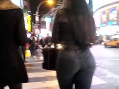 Round ass brunette in tight jeans