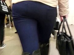 MILF's ass in tight pants