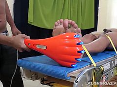 He is delightfully ticklish, and his boy feet are to die for. We have him strapped down on the Laughing Asians tickle rack for sexy straight boy Willy to have his way with. Then Ricky steps in and tickles the hell out of him until hes tickled pink.