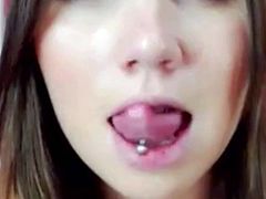 Sexy amateur showing off her studded tongue