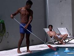 While out sun bathing at the pool, Cedric cant keep his eyes off the gorgeous Latin pool boy. After talking Nestor into a quick dip, the two kiss and head for a more private place to play. There, Cedric pulls off his trunks to reveal his stiff uncut cock and Nestor quickly goes down on it. Then Cedric gives his sexy pool boy a good dick and ass licking, before taking the Latin bottom from behind. The two bareback fuck all over the sofa, until Nestor cums, while Cedric breeds his young ass.