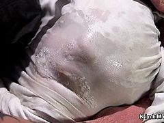 Hogtied slave suffers water bondage