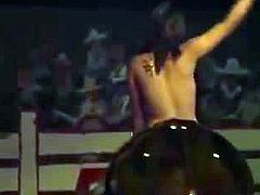 Topless bull rider