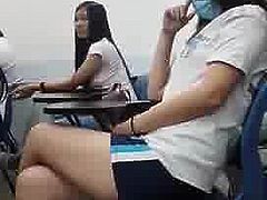 Asian Girl Syntribating in Class