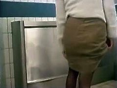 Woman Pissing Standing Up in Mens Public Toilet