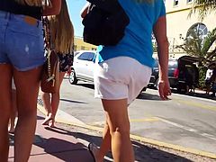 Candid voyeur perfect blonde in jean shorts