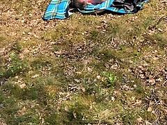 Naked man masturbating and ejaculating in the sun