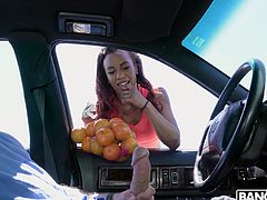 She was just selling oranges, so she was surprised to see a guy jacking off in his car. The stunning brown babe was so turned on, that she sucked him deep and jerked him off right there. Look at her slobber all over his white cock.