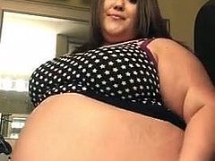 Short Clip of brunette SBBBW playing her huge belly 1