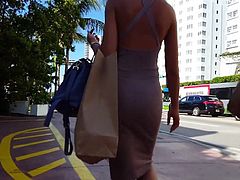 Candid voyeur gorgeous in brown tight dress vpl model