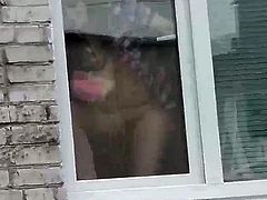 Naked milf washes windows and catches me spying on her