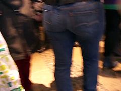 girl in hot blue jeans with round curves