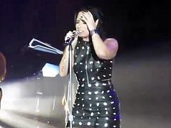 Focus on demi lovato leather outfit. Her outfit is a cum rag
