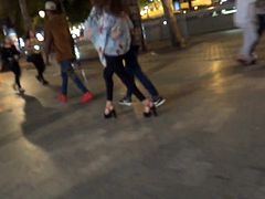 Candid hot young girl with high heels sandals