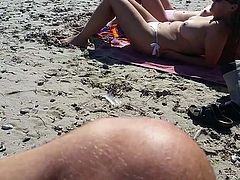 Cute naked teens on the beach