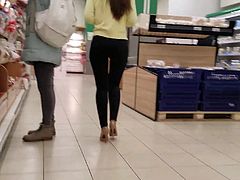 Beauty girl with sexy ass and body in the supermarket