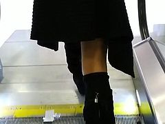 Pantyhose and overknees on escalator