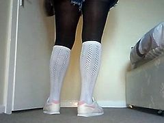 White pelerine knee socks and black tights encasement