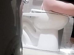 Girl on toilet.