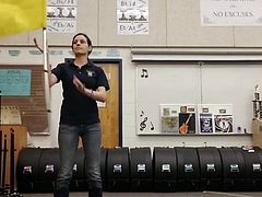 Band teacher dancing in front of camera