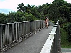 Flashing public nudity walk across main road bridge