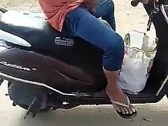 Guy wanking on a motorcycle