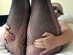 Ass Queen In Fishnets Shakes Her Ass On The Bed In Pantyhose